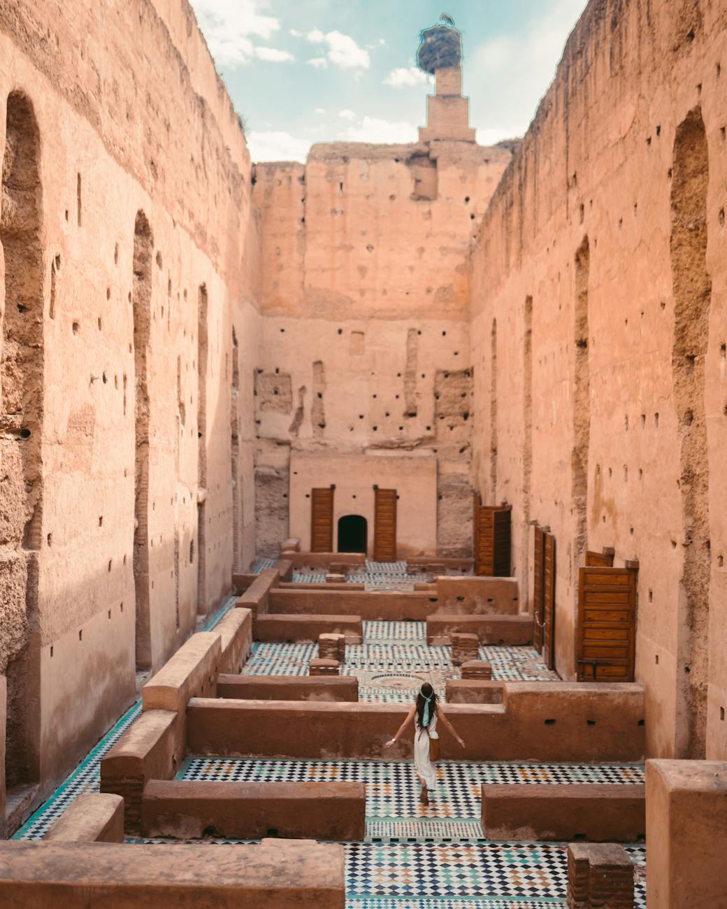 woman inside el badii palace
